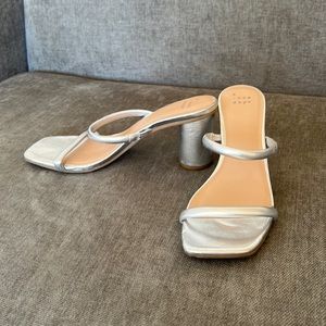 Silver lightly worn strappy heels